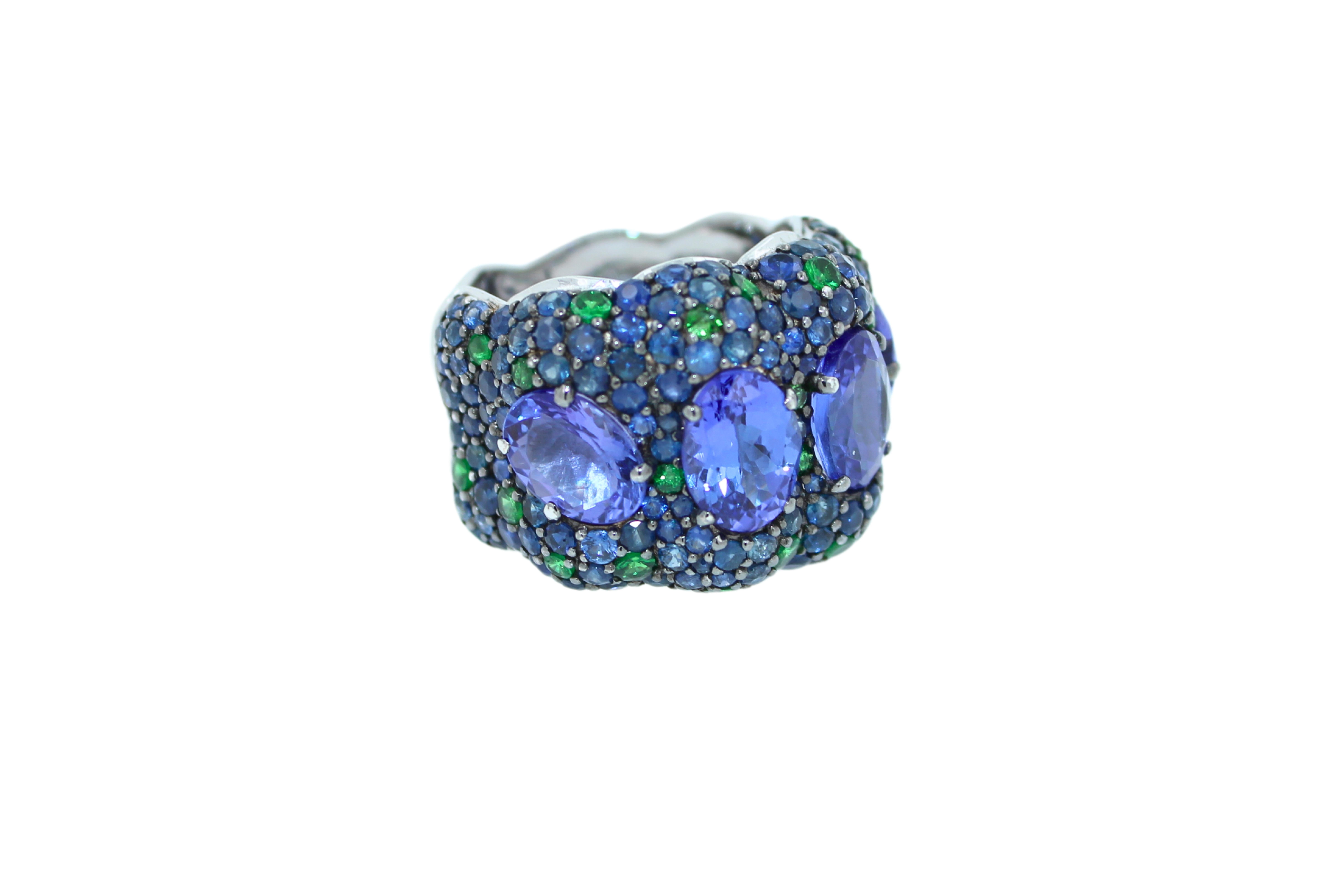 Modern Oval Blue Tanzanite Green Tsavorite Sapphire Pave Dome 18 Karat White Gold Ring For Sale