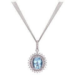 Oval Blue Topaz 3.19ct Pendant Necklace 18Kt White Gold & Double Diamond Halo