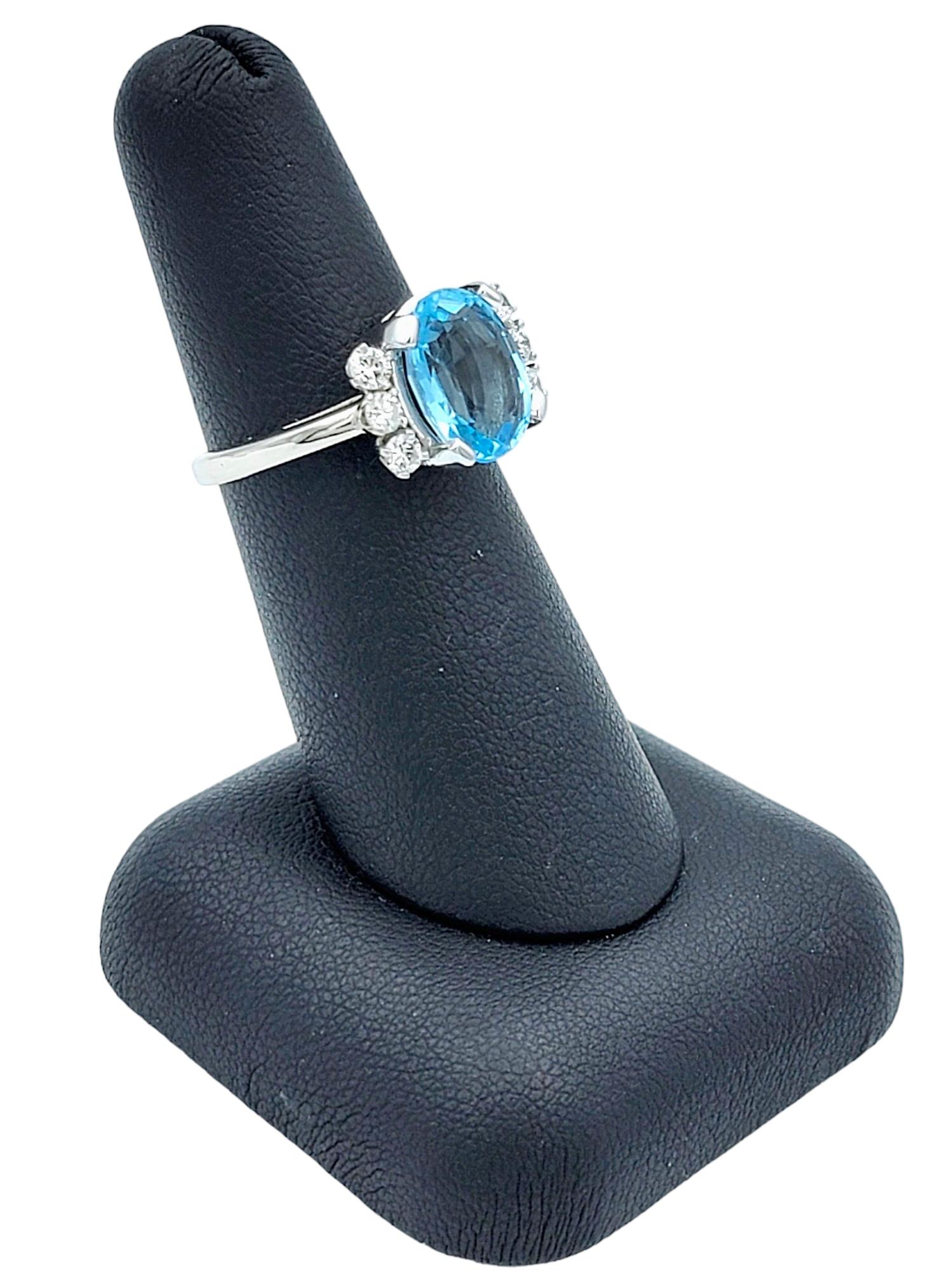Oval Blue Topaz and Round Diamond Flanked Cocktail Ring in 14 Karat White Gold For Sale 4