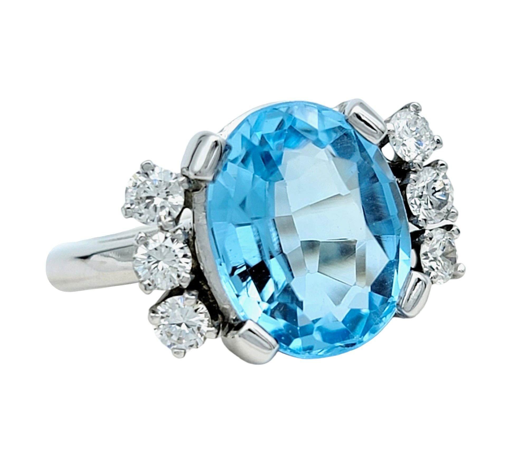 Ring Size: 6.5

This elegant ring features a captivating oval blue topaz as its centerpiece and is set in lustrous 14 karat white gold. Flanking the topaz on each side are 3 shimmering round diamonds, adding a touch of brilliance and sophistication