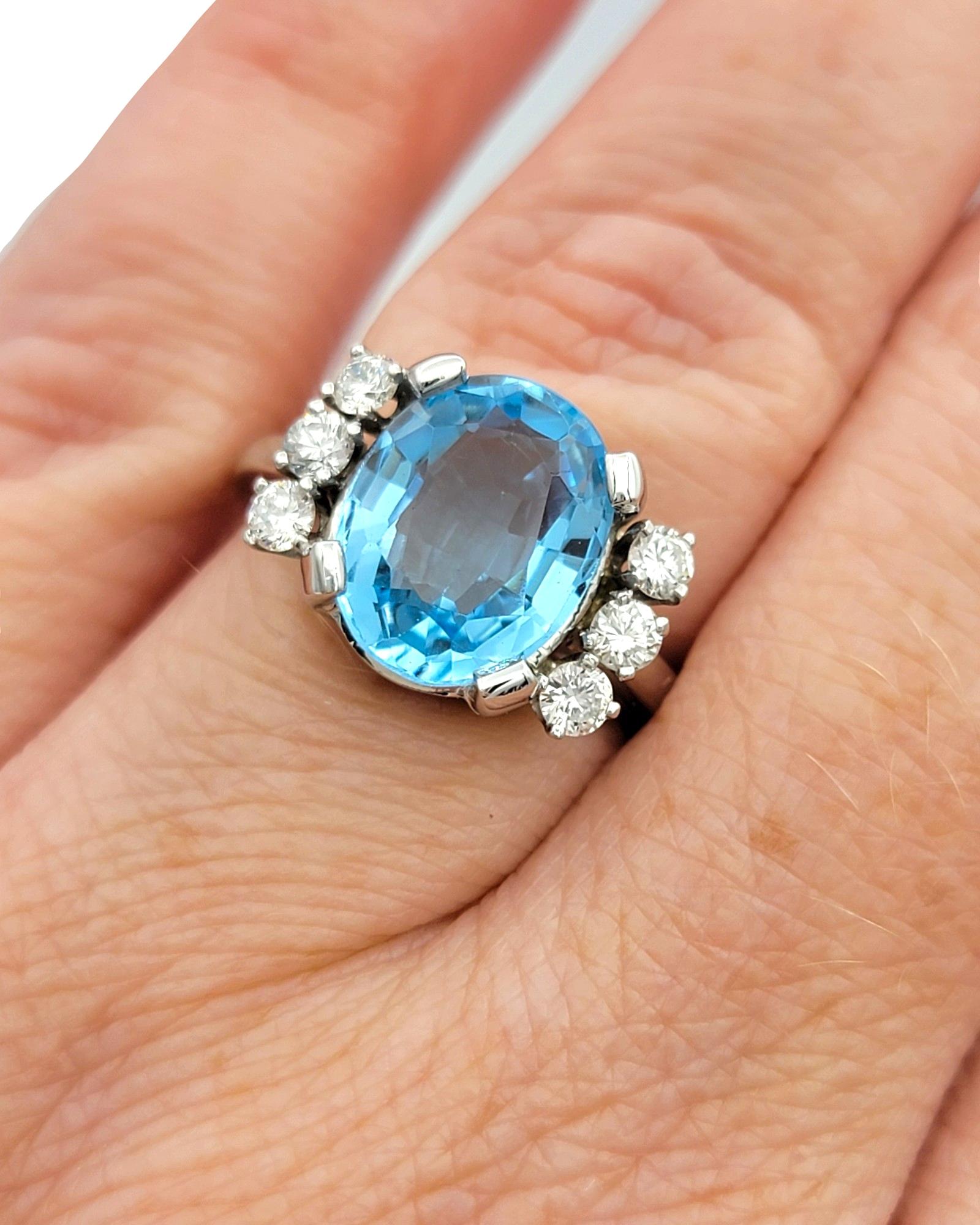 Oval Blue Topaz and Round Diamond Flanked Cocktail Ring in 14 Karat White Gold For Sale 2