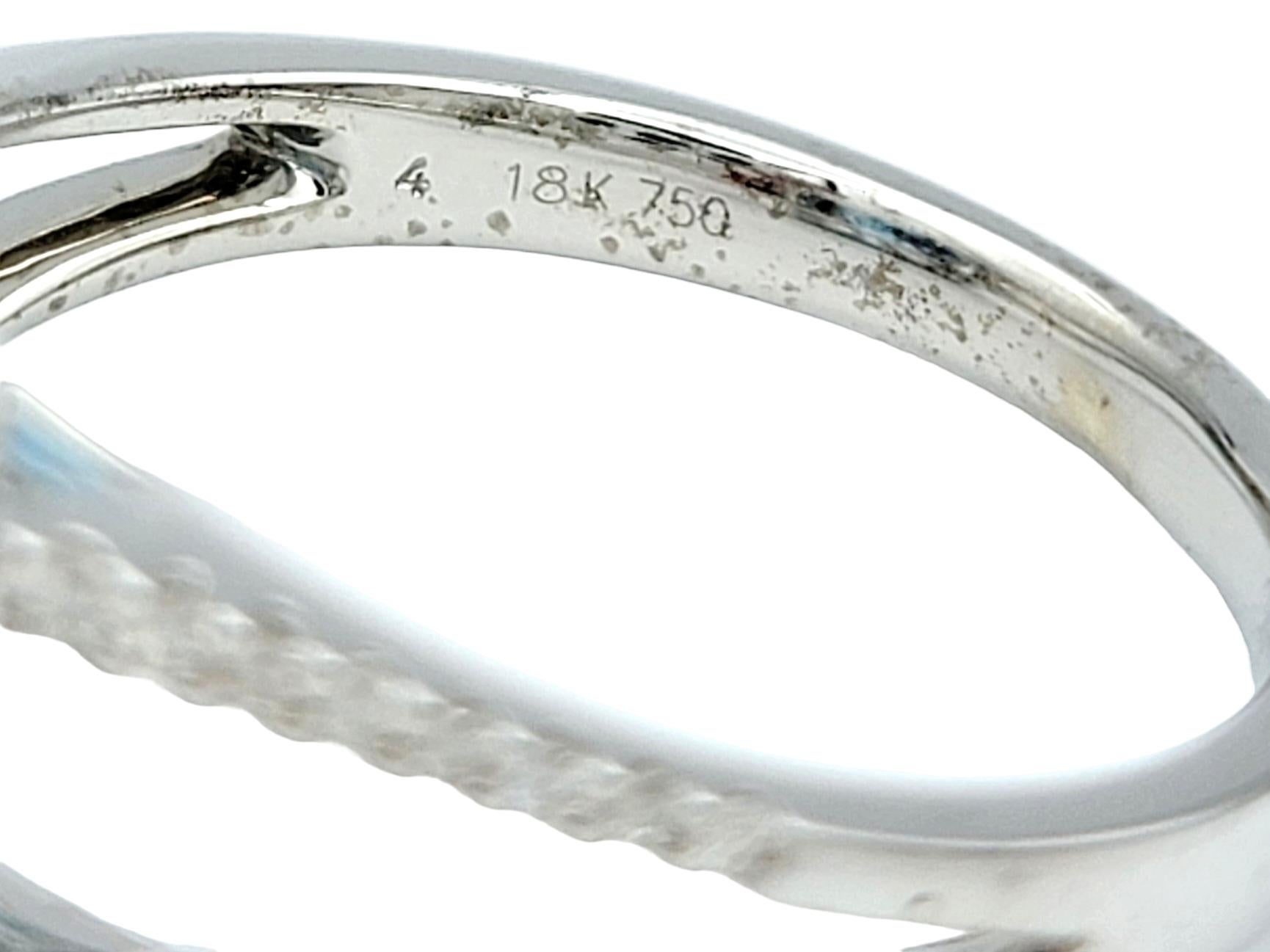 Oval Blue Topaz and Square Diamond Halo Split Shank Ring in 18 Karat White Gold For Sale 2
