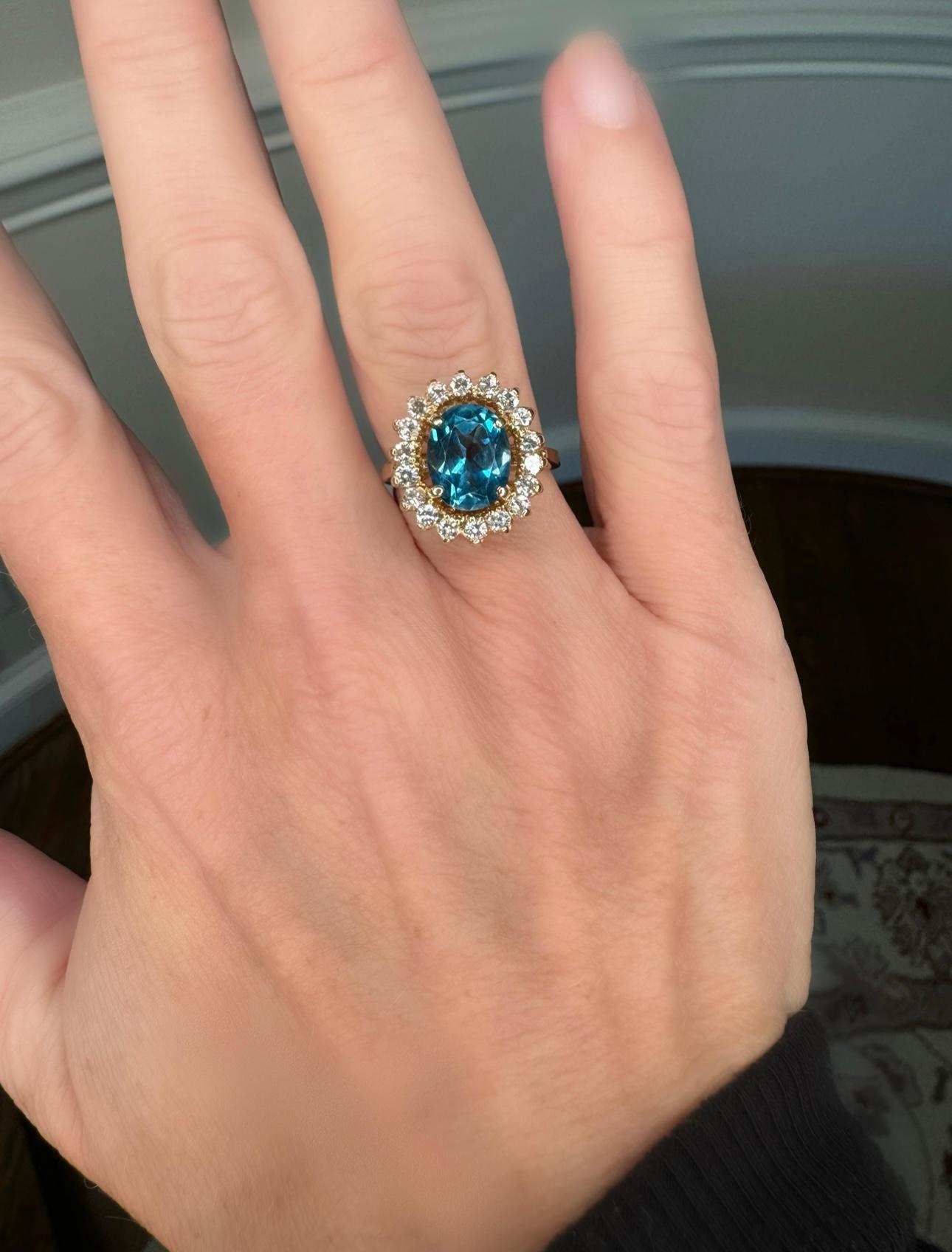 Modern Oval Blue Topaz, Diamond and 14K Yellow Gold Ring For Sale
