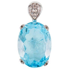 Oval Blue Topaz Pendant Set in Sterling Silver