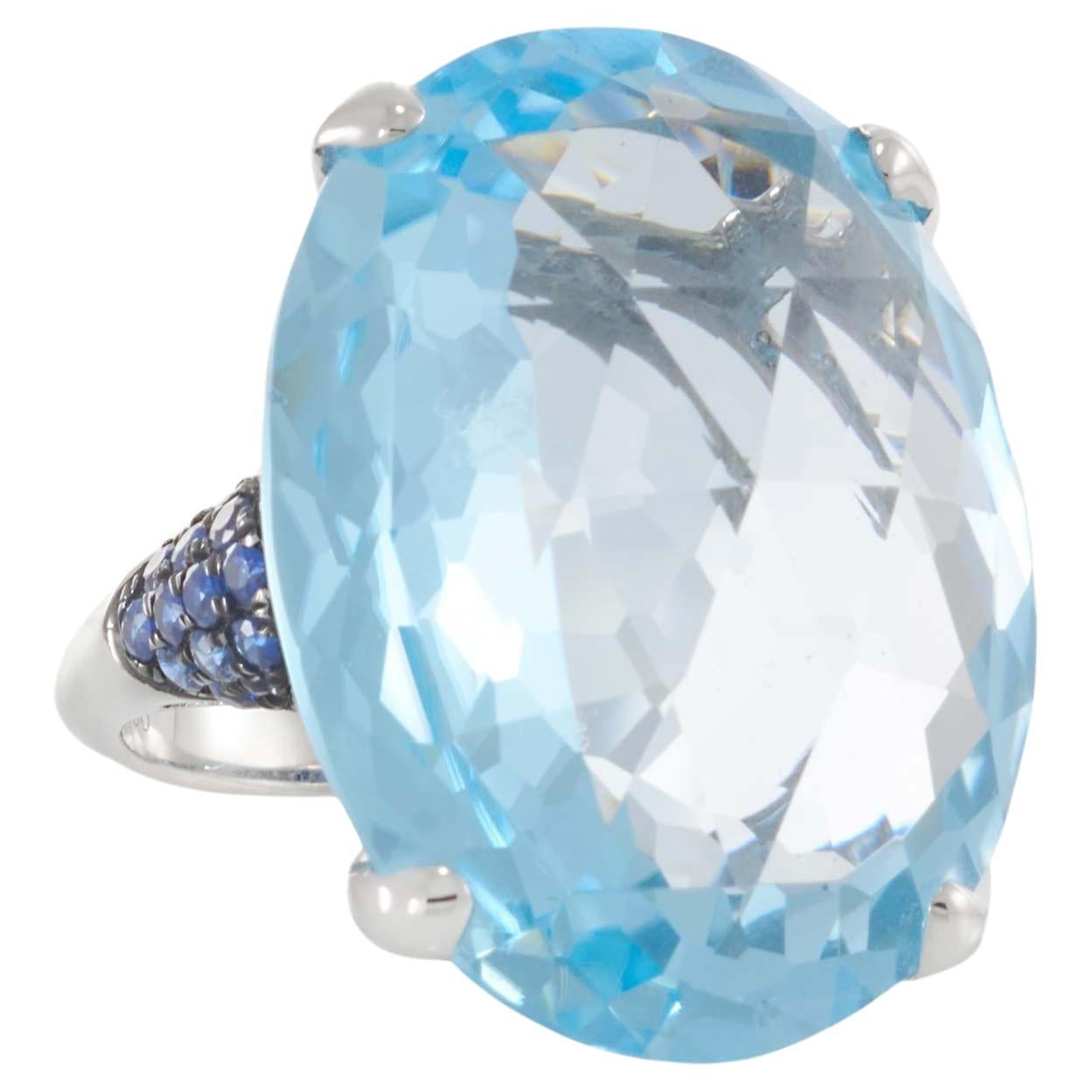 Oval Blue Topaz, Sapphire, and Diamond Ring in 18KT White Gold