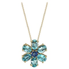 Oval Blue Topaz with Round Sapphire Flower Design 18 Karat Gold Pendant