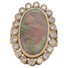 Oval Boulder Opal & 2 Carat Round Cut Diamond Halo 18K Gold Vintage Ring