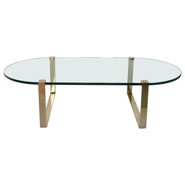 Oval Brass and Floating Glass Coffee Table at 1stdibs