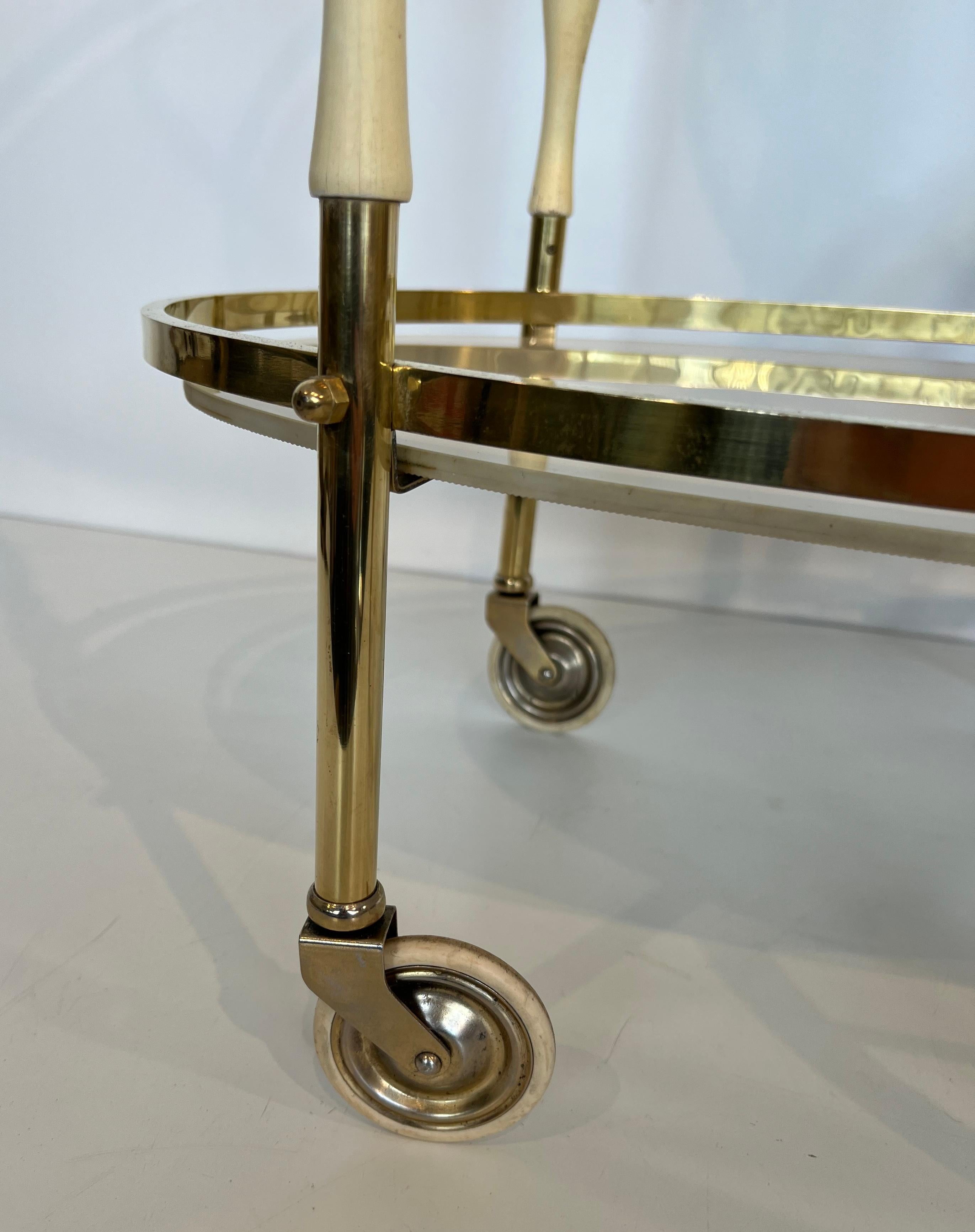 Oval Brass and Lacquered Wood Italian Drinks Trolley For Sale 2