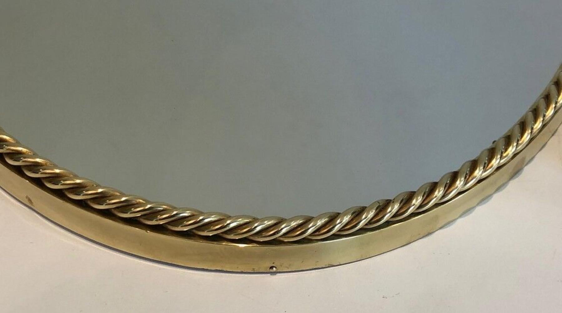 Espejo ovalado de latón rodeado de un cordón Al estilo de la Maison Bagués. en Bueno estado para la venta en Marcq-en-Barœul, Hauts-de-France
