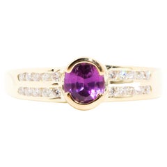 Oval Bright Purple Sapphire and Diamond Vintage Ring in 14 Carat Yellow Gold