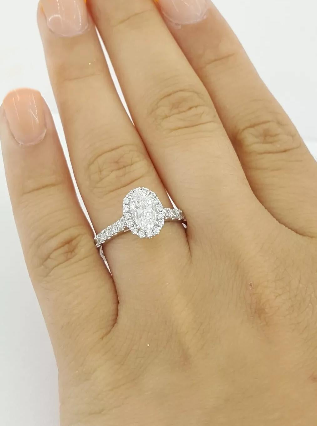 Contemporary Oval Brilliant Cut Diamond Halo 14k White Gold Engagement Ring For Sale
