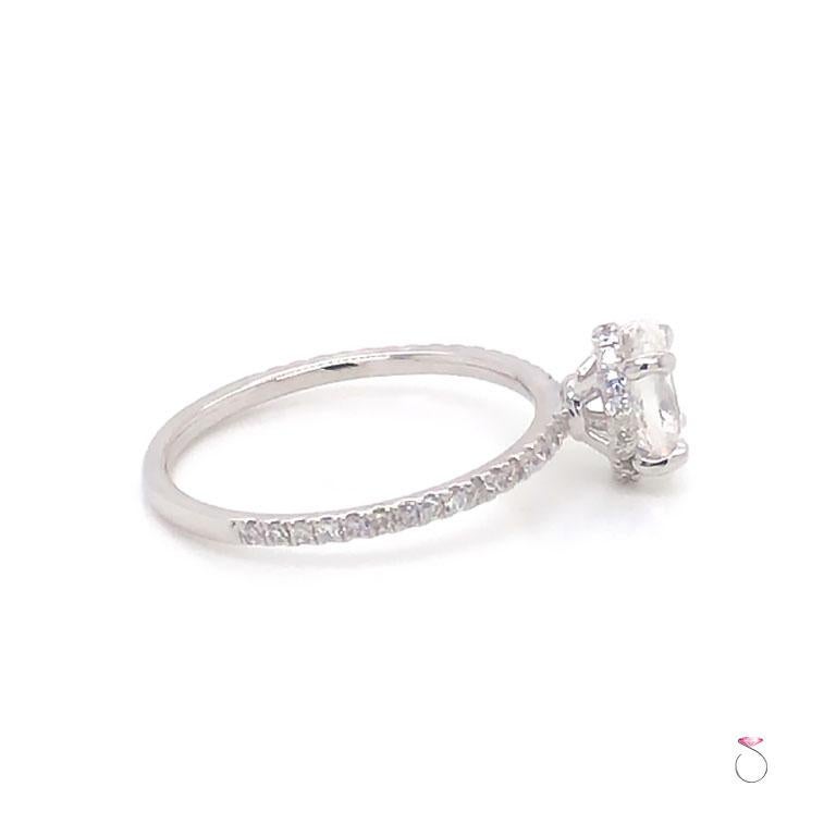 Bague de fiançailles en or 18 carats avec diamant ovale brillant et halo caché au centre 0,71 carat F, VS1, certifié GIA en vente 1