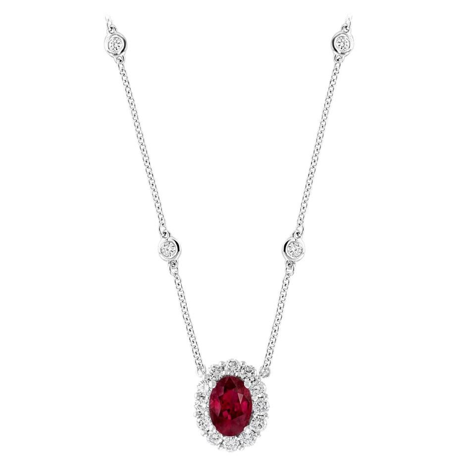 Oval Brilliant Ruby Pendant Weighing .71ct with .48ct of Diamonds in 18kt White For Sale