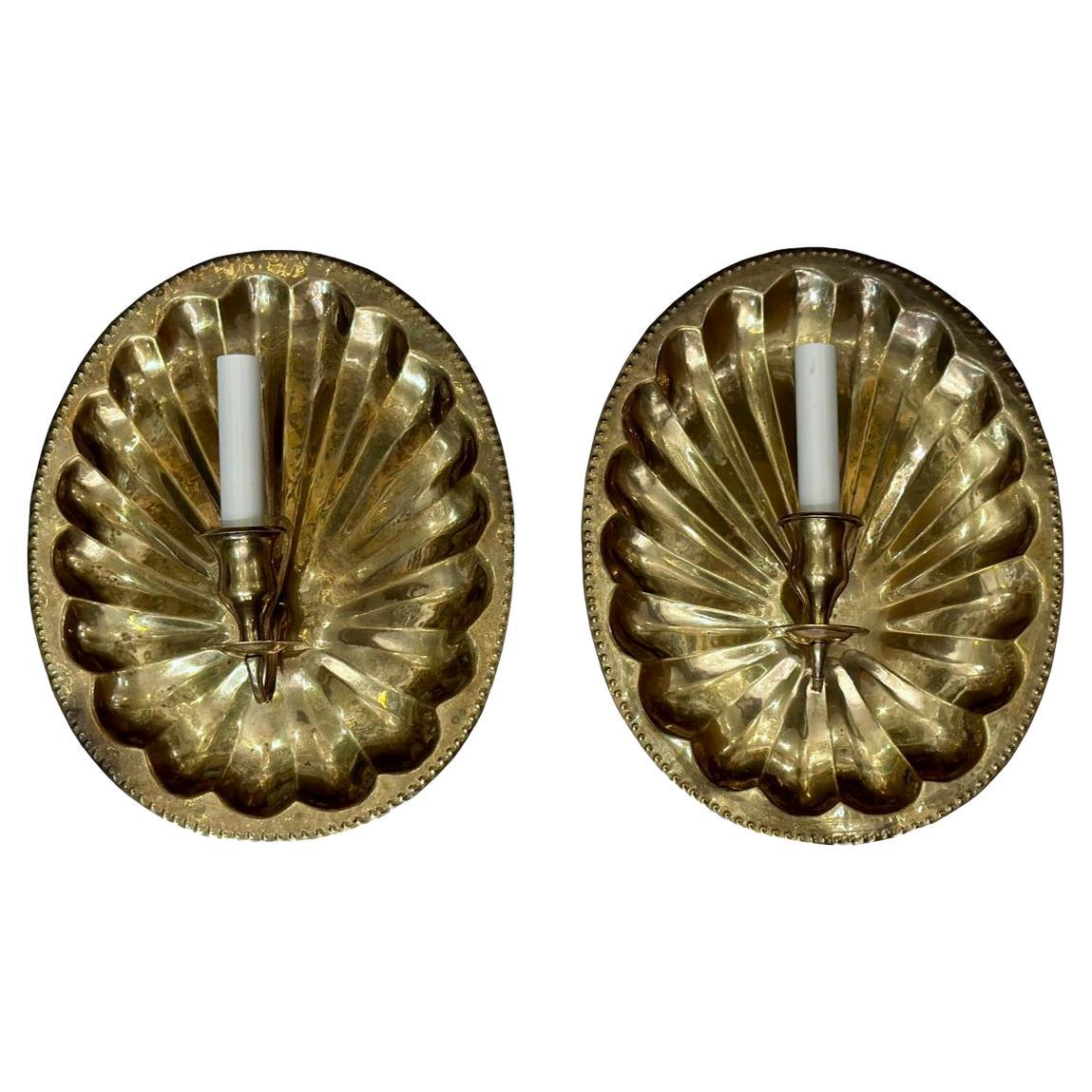 Applique ovali a conchiglia in bronzo