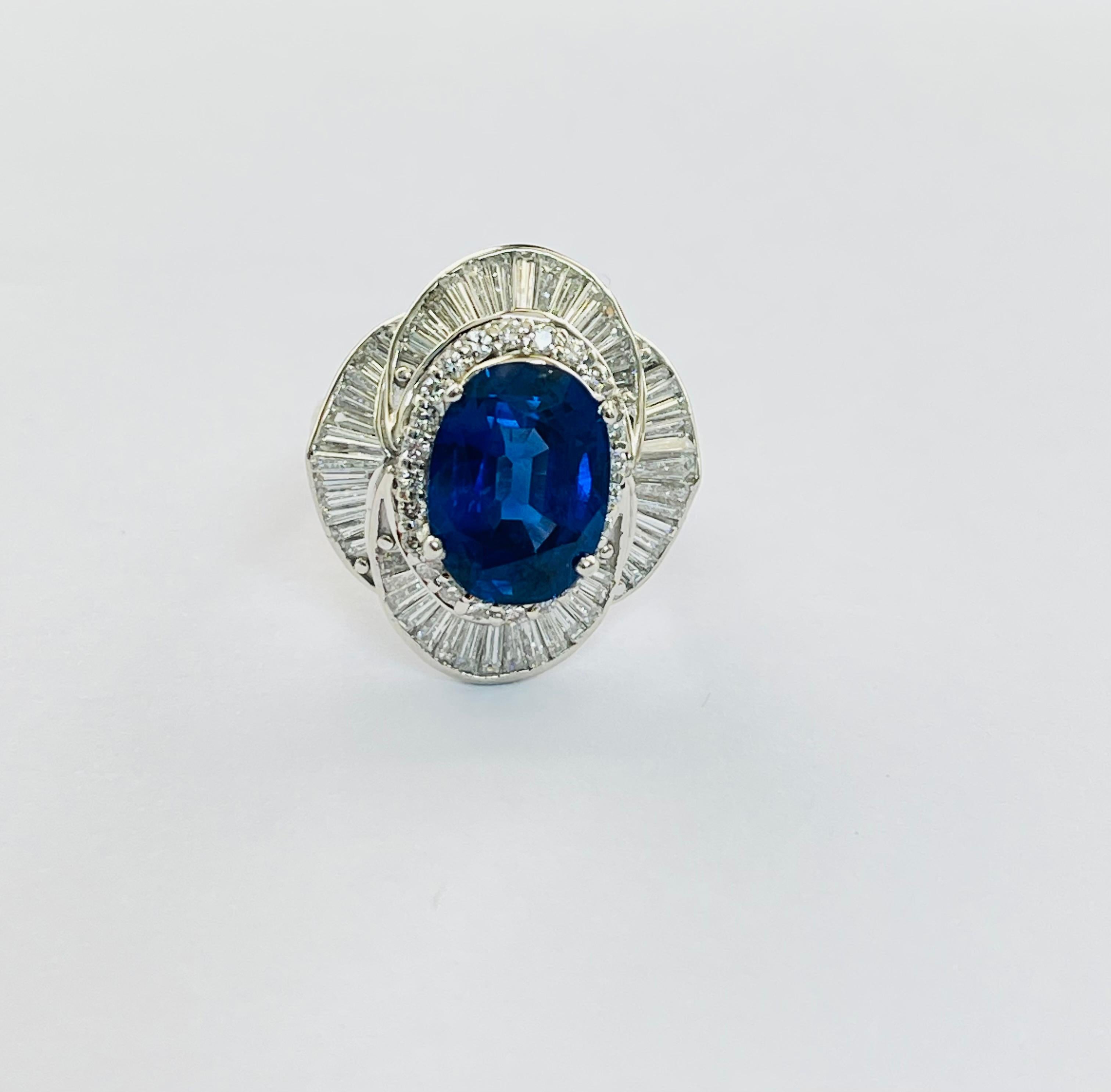 Most gorgeous Oval Blue Sapphire Burma no heat and diamond engagement ring beautifully handcrafted in Platinum. 

The details are as follows : 

Oval Blue Sapphire Weight : 5.73carats 
Measurements : 12.10x9.06x5.75mm 
Diamond weight : 2.50 Carats (