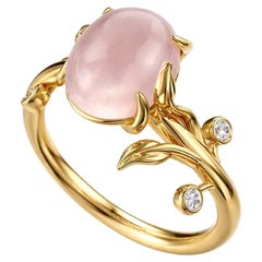 Oval cab pink quarz ring in 14k gold