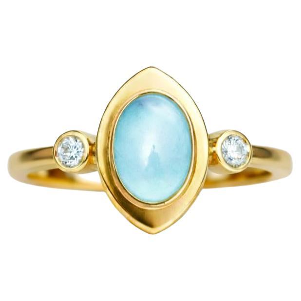 Oval cabochon aquamarine 14k gold ring