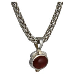 Oval Cabochon Carnelian 9k Yellow Gold and Sterling Silver Pendant