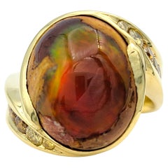 Oval Cabochon Cut Fire Opal and Diamond Ring in 18 Karat Yellow Gold