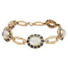 Bracelet à maillons en or rose 14 carats, pierre de lune ovale taille cabochon et saphir bleu
