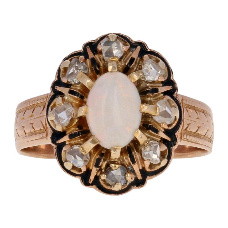 Oval Cabochon Cut Opal and Diamond Victorian Ring, 14 Karat Gold Antique Halo