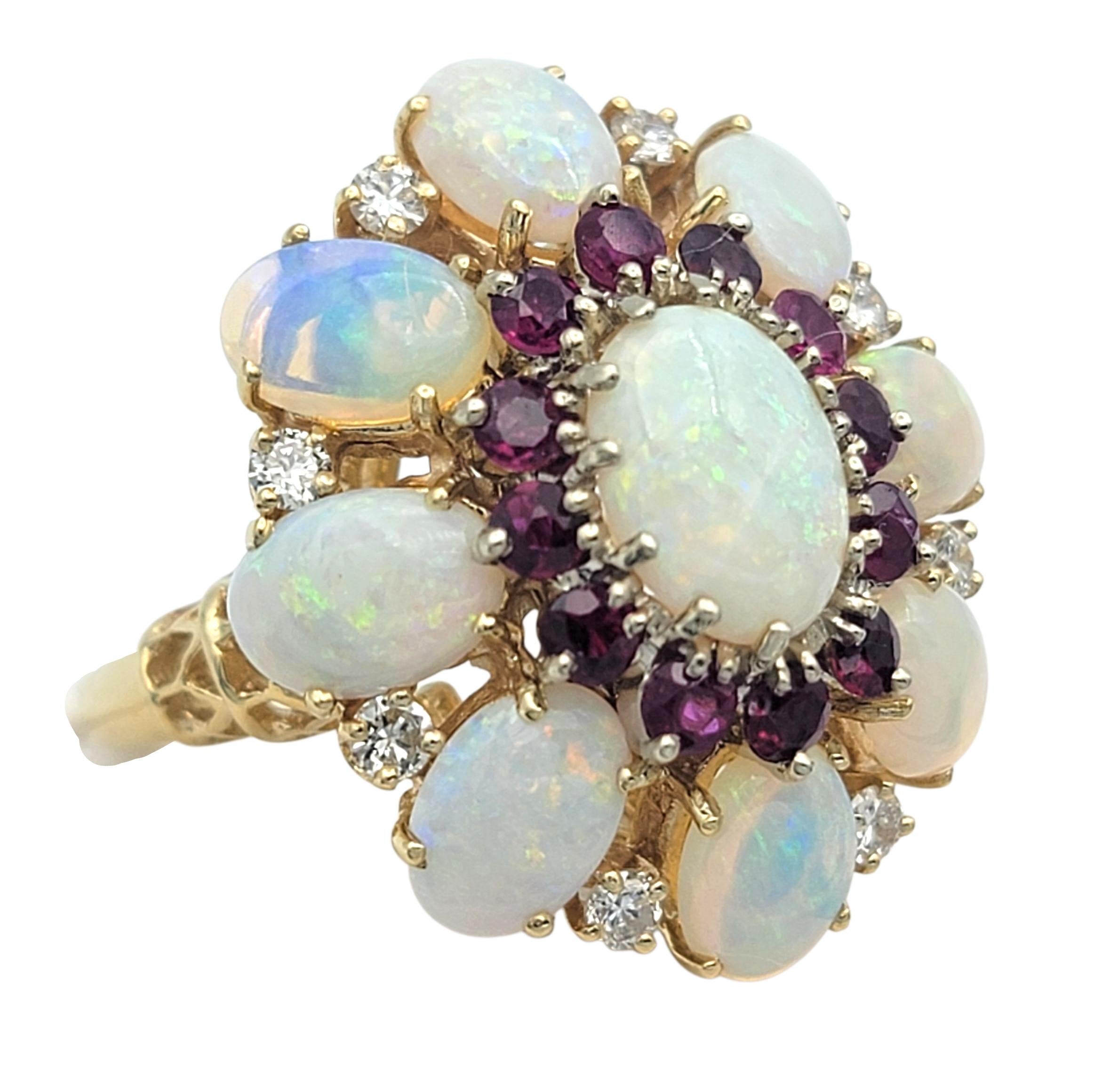 Contemporary Oval Cabochon Cut Opal, Diamond & Ruby Cluster Flower Ring 14 Karat Yellow Gold For Sale