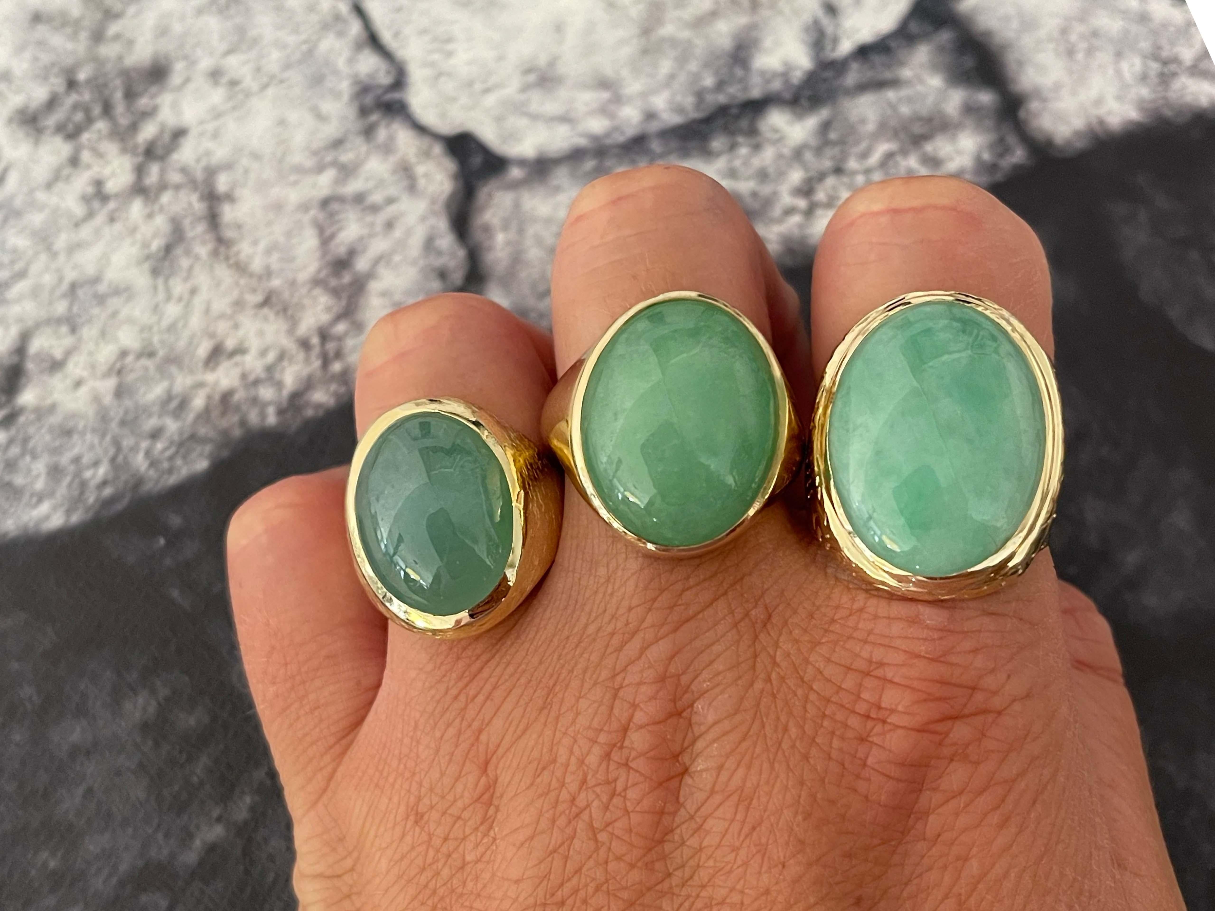 Item Specifications:

Metal: 14k Yellow Gold 

Style: Statement Ring

Ring Size: 11.75 (resizing available for a fee)

Total Weight: 13.8 Grams

Gemstone Specifications:

Center Gemstone: Jadeite Jade

Shape: Oval

Color: Green

Cut: Cabochon

Jade