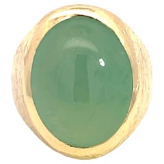 Oval Cabochon Green Jade Ring with Satin Shoulders in 14k Yellow Gold