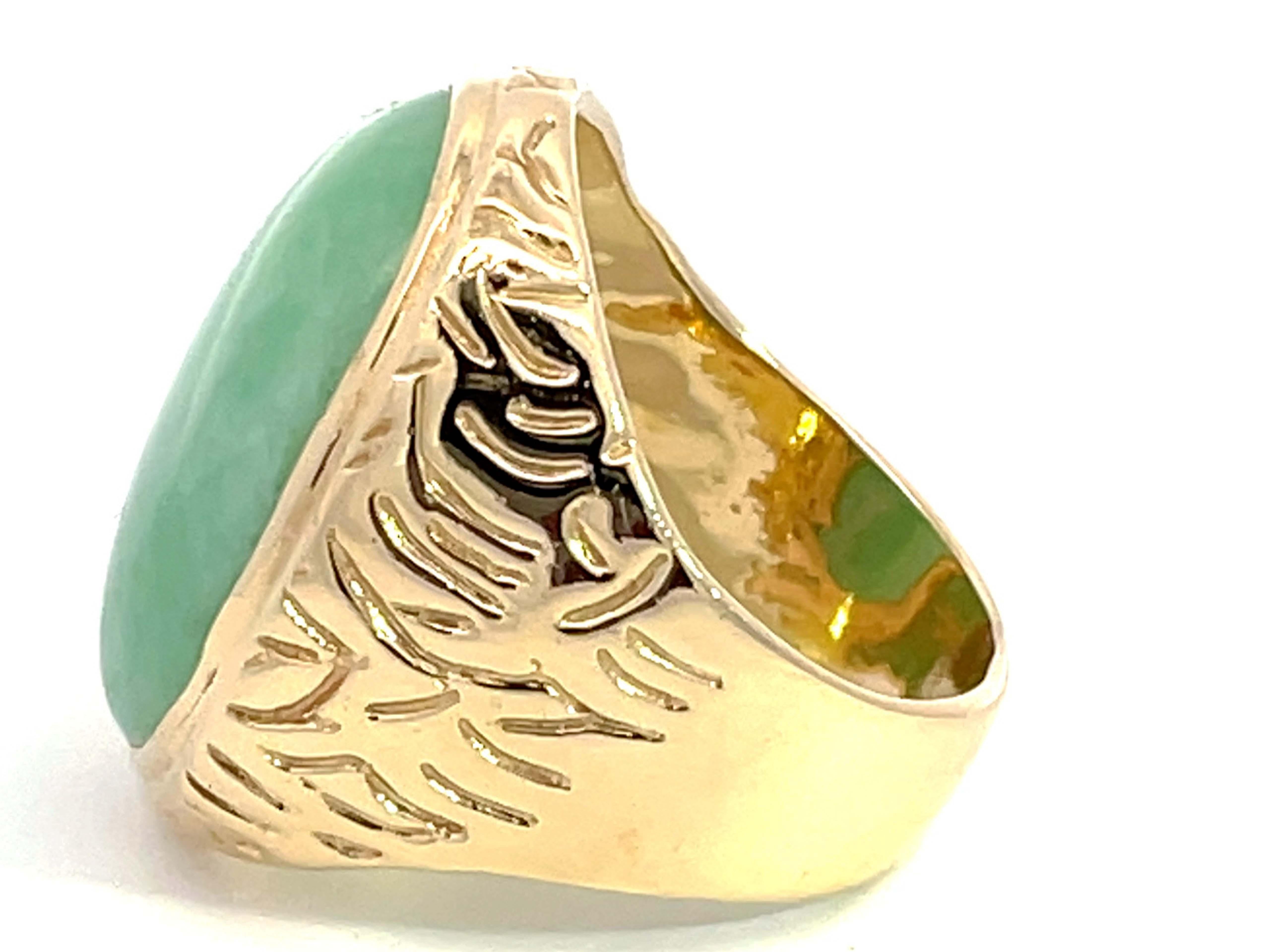 Modern Oval Cabochon Green Jade Ring with Textured Bark Shoulders in 14k Yellow Gold For Sale