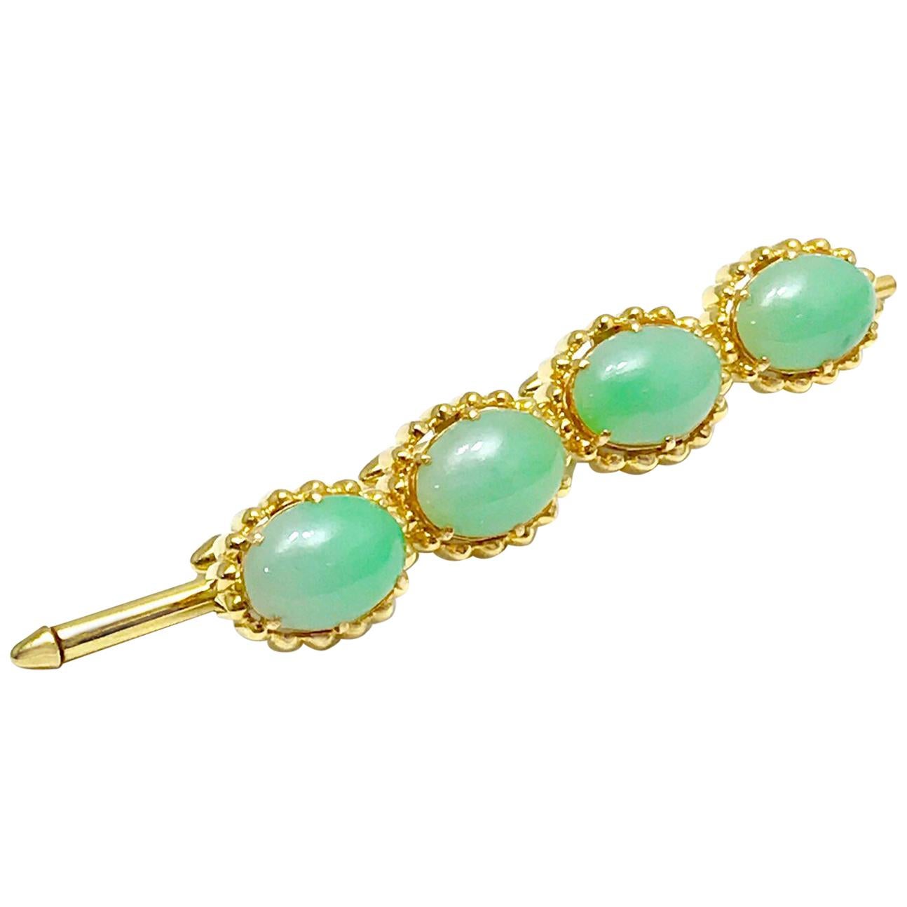 Oval Cabochon Jade and 18 Karat Yellow Gold Stud Set For Sale