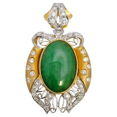 Vintage Oval Cabochon Jade and Bow Detail Pave Diamond Pendant in 18 Karat Gold