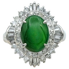 Oval Cabochon Jade and Diamond Halo Cocktail Ring in Polished Platinum