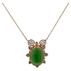 Oval Cabochon Jade Diamond 14 Karat Yellow Gold Contemporary Pendant Necklace