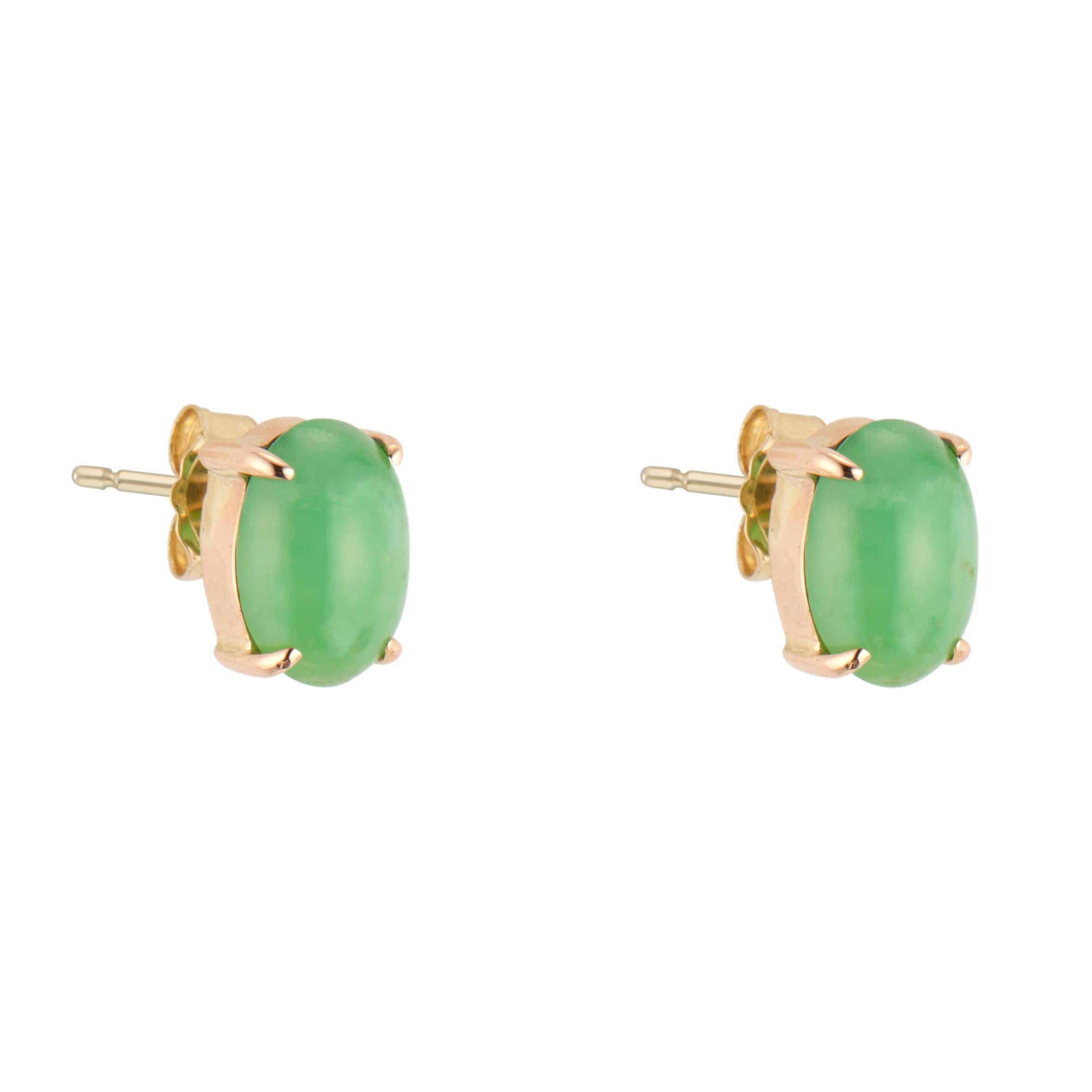 2 oval cabochon jade earrings. GIA certified oval jade set in 14k yellow gold 4 prong basket settings. 

2 oval jade, 7.25x5.13x2.42mm GIA certified# 2225168090
14k yellow gold
Weight: 1 gram
