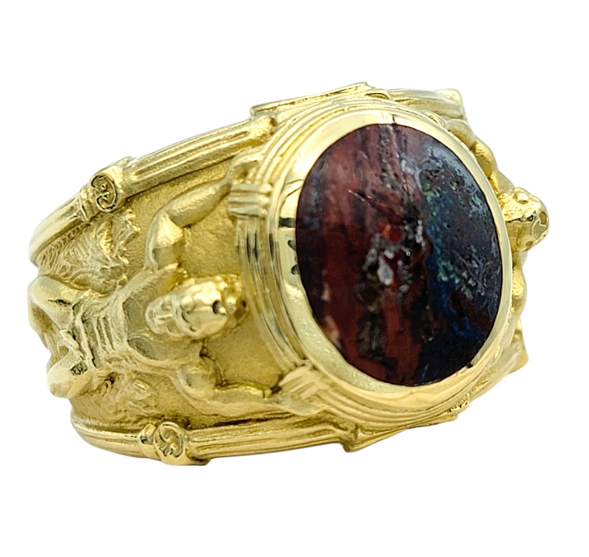 Ring Size: 10

Embrace the timeless allure of natural beauty with this oval cabochon jasper band ring, a piece that exudes strength and elegance. The center stone, a richly hued oval cabochon jasper, captures the essence of earthy sophistication.