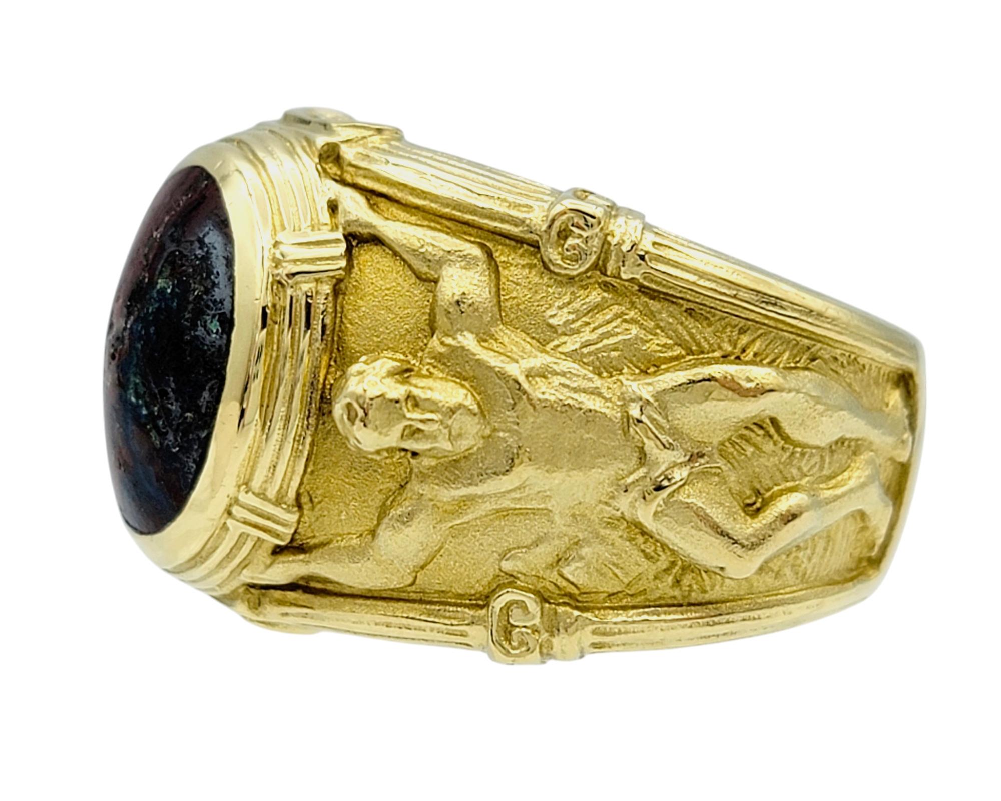 Oval Cabochon Jasper Ornate Hercules Motif Wide Band Ring 18 Karat Yellow Gold In Good Condition For Sale In Scottsdale, AZ