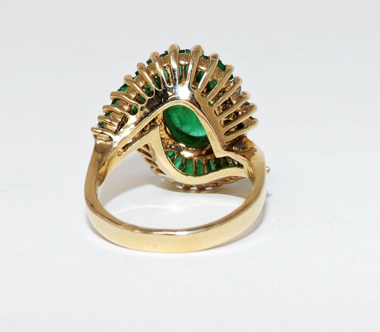 Contemporary Oval Cabochon Natural Beryl Emerald and Diamond Bypass Ring 14 Karat Yellow Gold For Sale