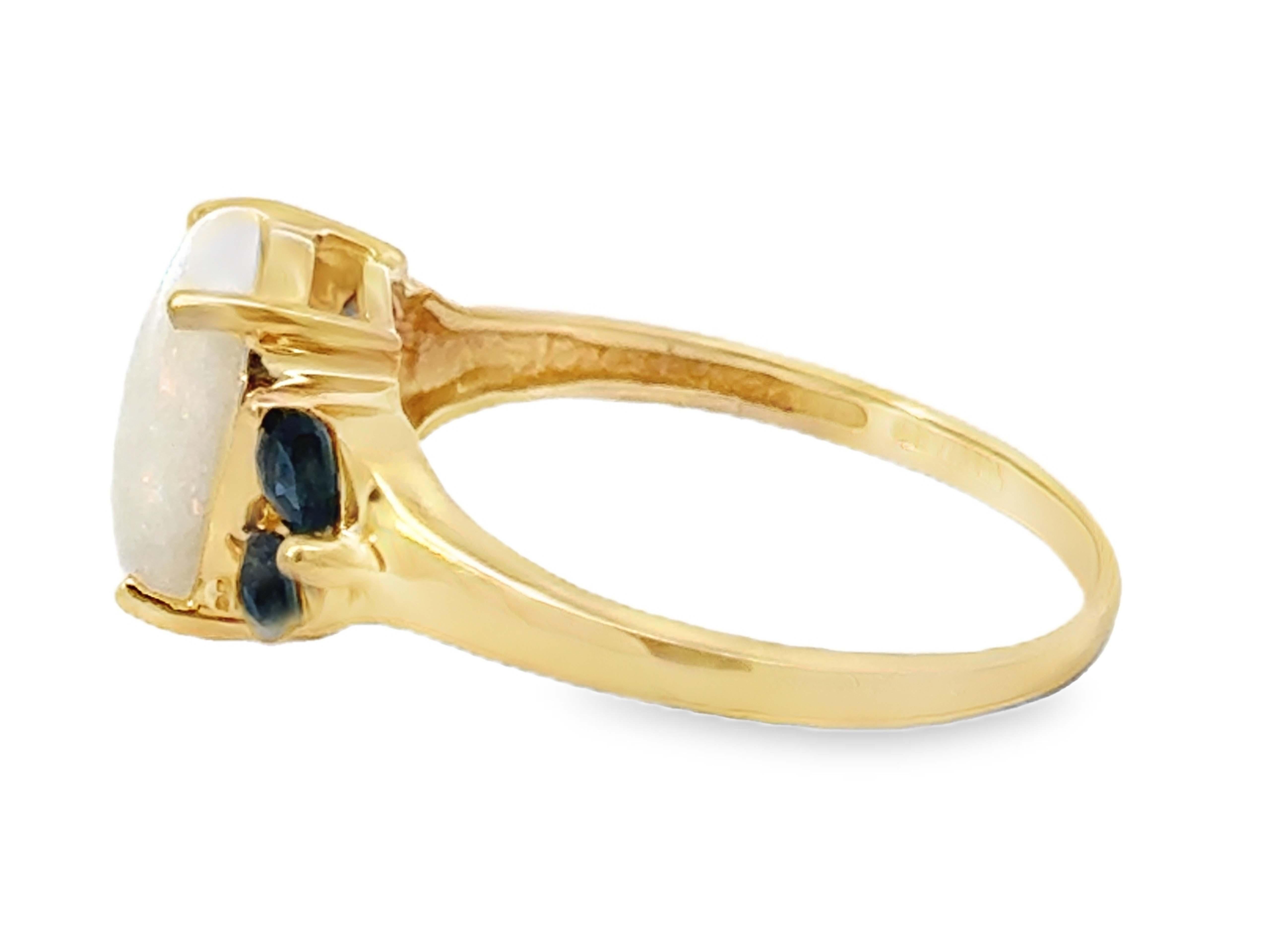 Oval Cabochon Opal and Pear Shaped Sapphires Ring 14k Yellow Gold For Sale 1