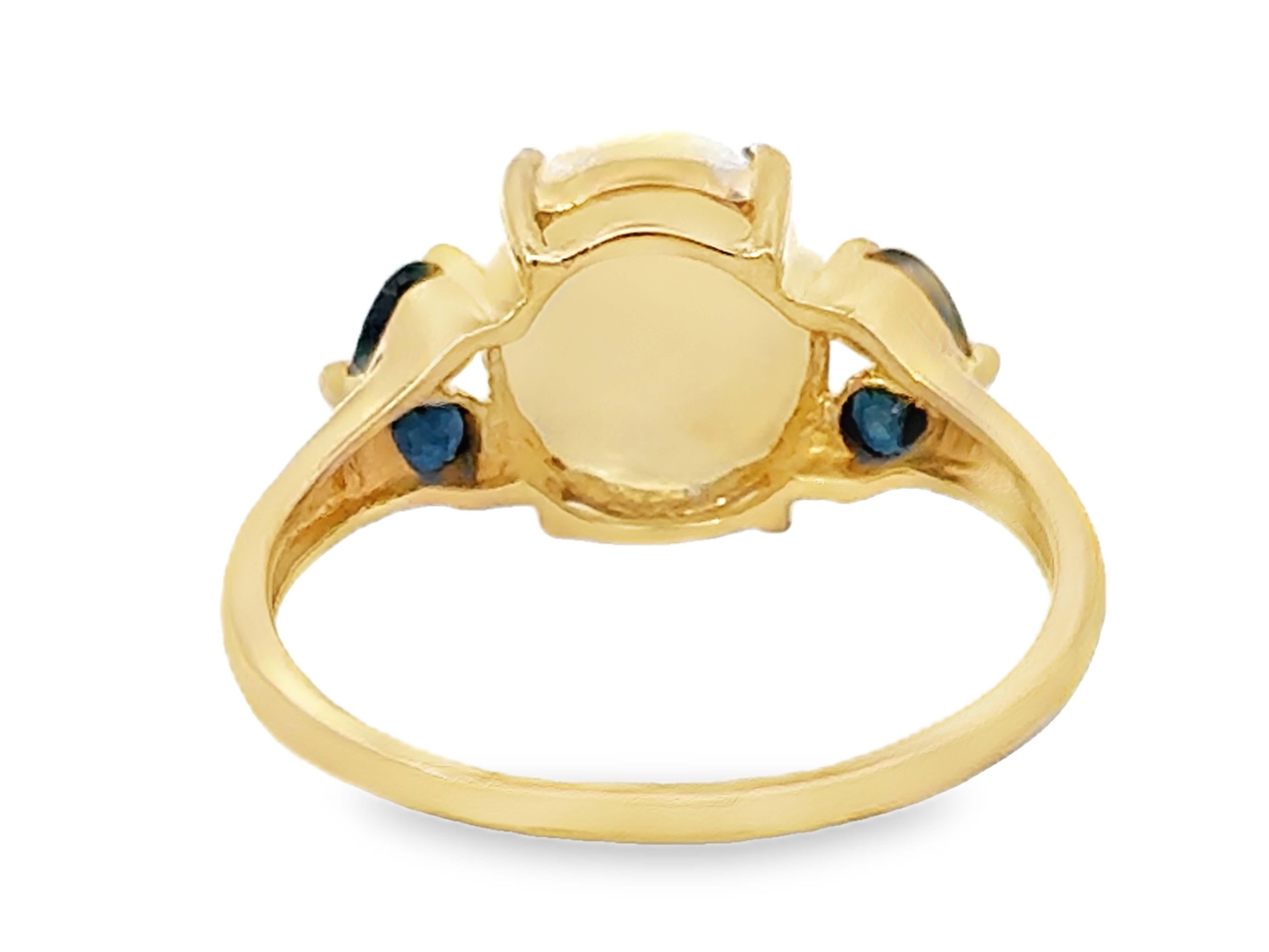 Oval Cabochon Opal and Pear Shaped Sapphires Ring 14k Yellow Gold For Sale 2