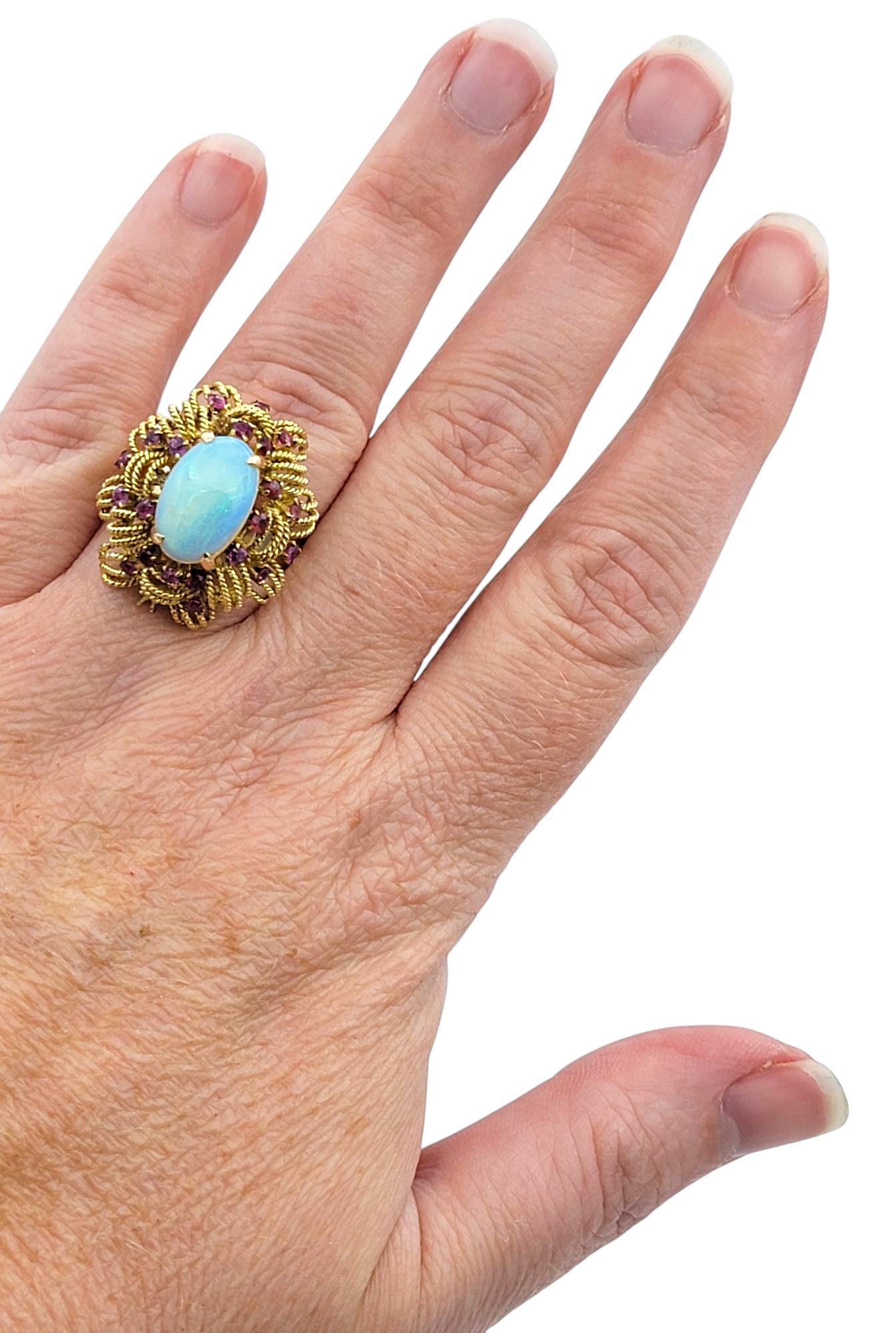 Women's Oval Cabochon Opal Cocktail Ring with Rubies in Textured 14 Karat Yellow Gold For Sale