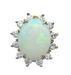 Oval Cabochon Opal Stud Earrings with Round Diamond Halos in 14 Karat White Gold