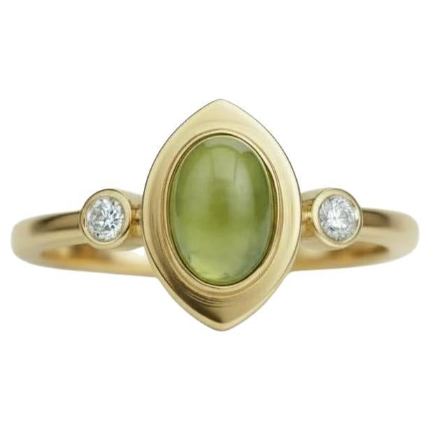Oval cabochon peridot 14k gold ring