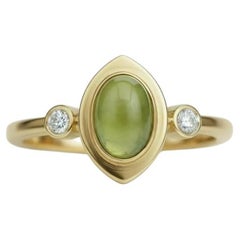 Oval cabochon peridot 14k gold ring