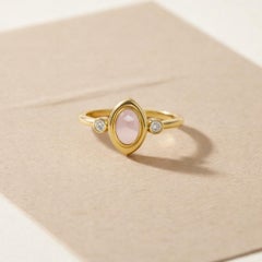 Oval cabochon pink quartz 14k gold ring