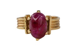 Oval Cabochon Ruby Ribbed Solitaire Ring