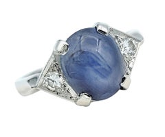 Oval Cabochon Star Sapphire and Diamond Cocktail Ring Set in 14 Karat White Gold