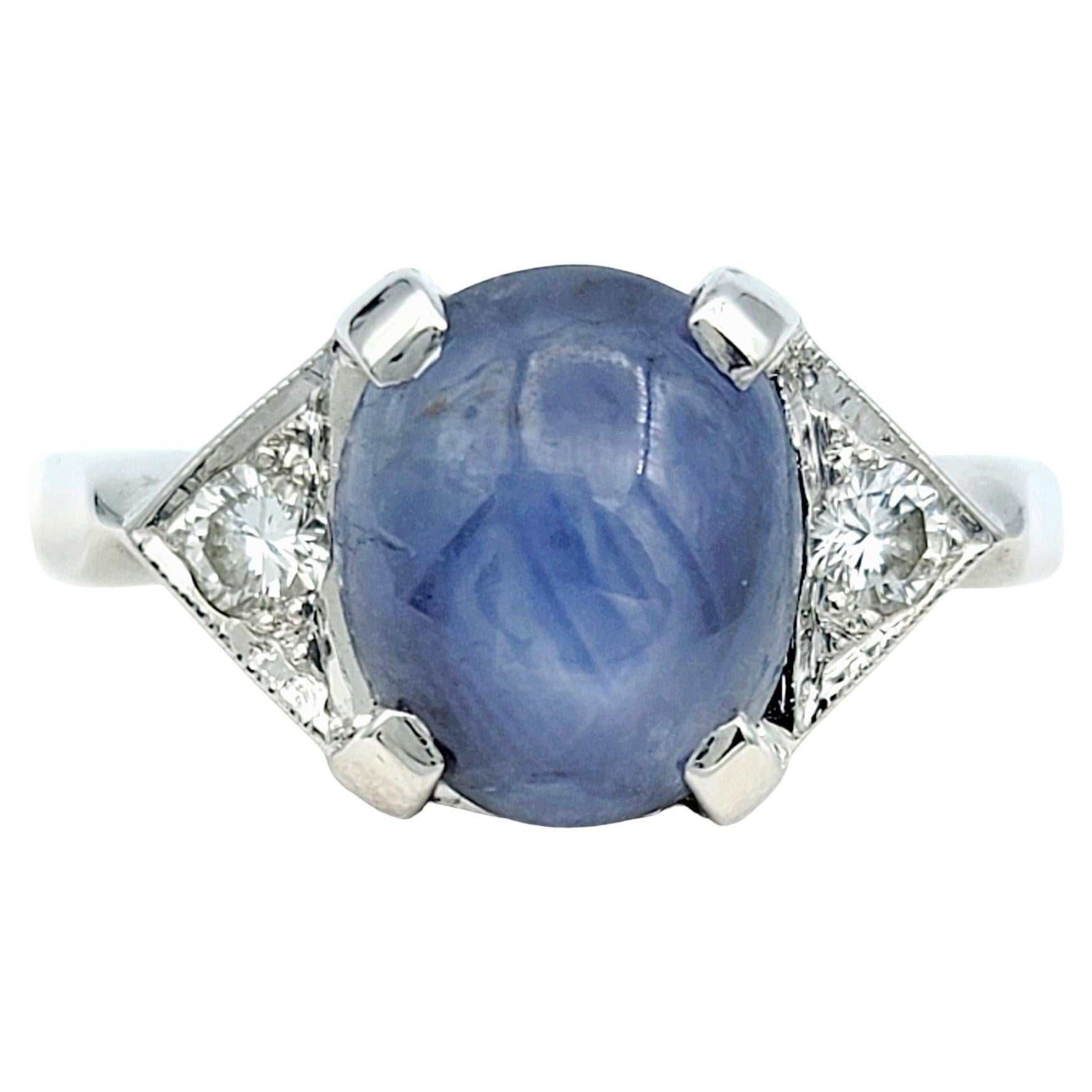 Oval Cabochon Star Sapphire and Diamond Cocktail Ring Set in 14 Karat White Gold For Sale