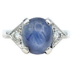 Oval Cabochon Star Sapphire and Diamond Cocktail Ring Set in 14 Karat White Gold