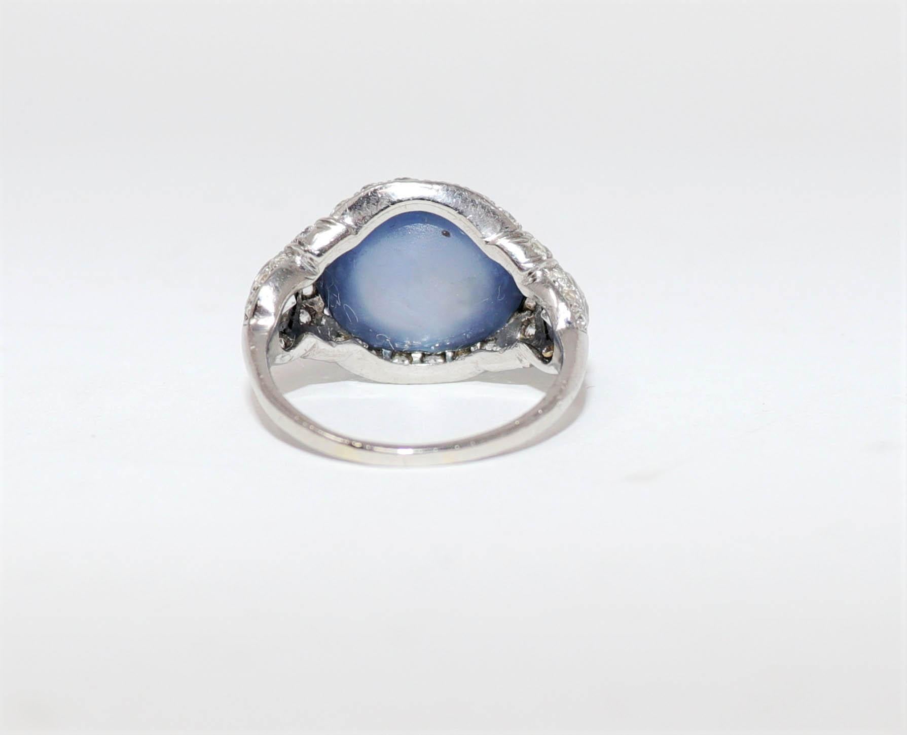Art Deco Oval Cabochon Star Sapphire and Diamond Ring in Platinum 15.4 Carats Total For Sale
